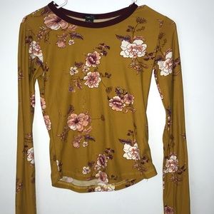 Dark yellow long sleeve top with floral design
